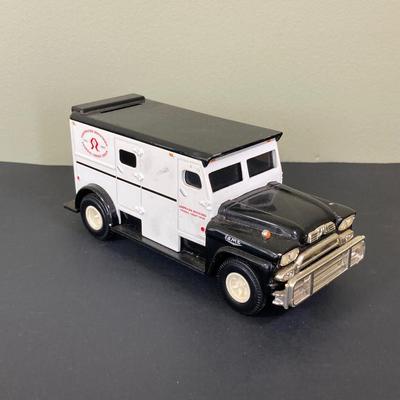 LOT 77: Deepwater Industries Federal Credit Union Diecast Armored Truck Bank, Oversized One Cent Bank and Hand Crafted Metal Brinks Truck