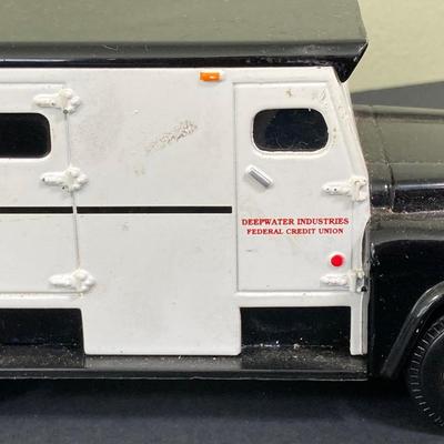 LOT 77: Deepwater Industries Federal Credit Union Diecast Armored Truck Bank, Oversized One Cent Bank and Hand Crafted Metal Brinks Truck