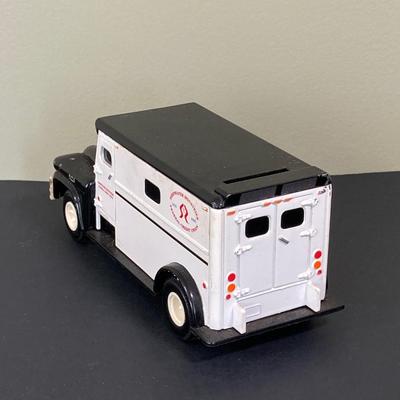LOT 77: Deepwater Industries Federal Credit Union Diecast Armored Truck Bank, Oversized One Cent Bank and Hand Crafted Metal Brinks Truck