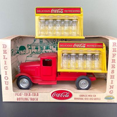 LOT 78: 1930's Coca-Cola Metal Toy Truck in Original Box (Gearbox) with Extra Bottles