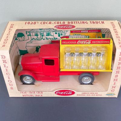 LOT 78: 1930's Coca-Cola Metal Toy Truck in Original Box (Gearbox) with Extra Bottles