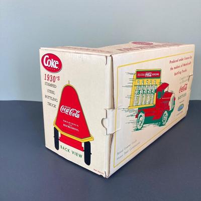 LOT 78: 1930's Coca-Cola Metal Toy Truck in Original Box (Gearbox) with Extra Bottles