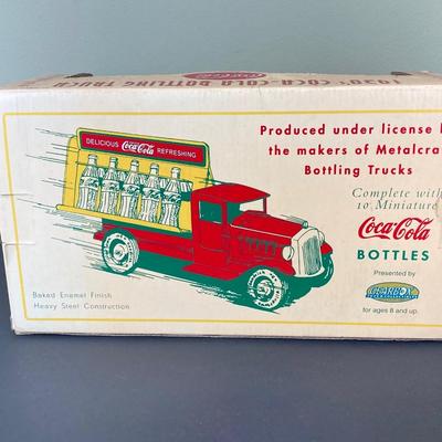 LOT 78: 1930's Coca-Cola Metal Toy Truck in Original Box (Gearbox) with Extra Bottles