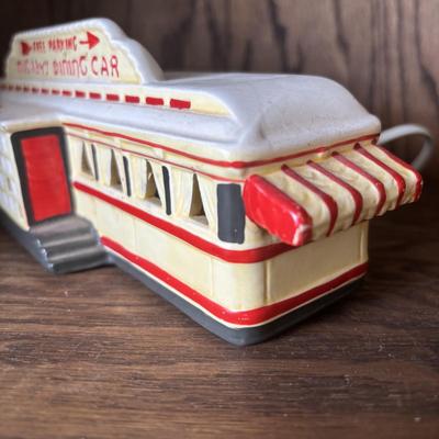 LOT 93: Roadside Diners & More: Lefton"s Great American Diner Series, A.C. Gilbert American Flyer "Frank & Beans",...
