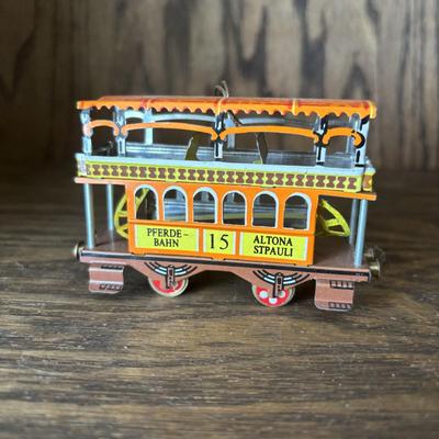 LOT 95: Cable/Streetcar Model Collection: City Transport, IDM by UMD Inc., Heinz 57 Trolly Bank & Tin Toy Trolly Ornament