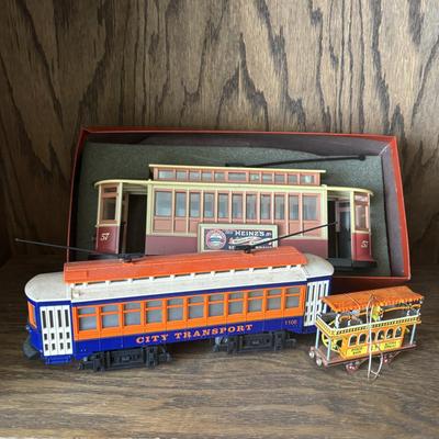 LOT 95: Cable/Streetcar Model Collection: City Transport, IDM by UMD Inc., Heinz 57 Trolly Bank & Tin Toy Trolly Ornament