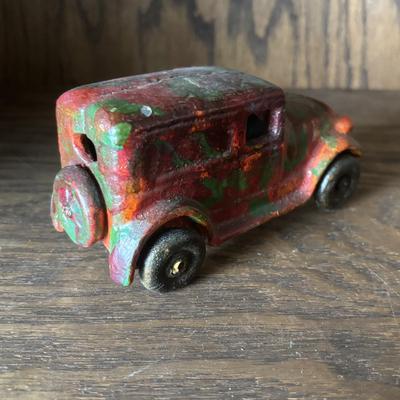 LOT 97: Cast Iron (3) and Tin Toy Car (1