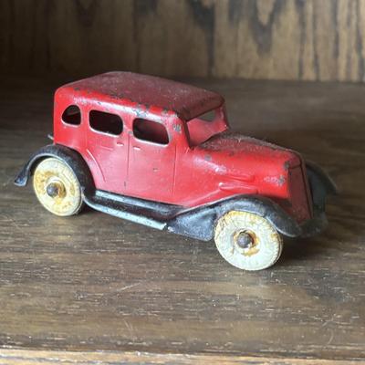LOT 97: Cast Iron (3) and Tin Toy Car (1