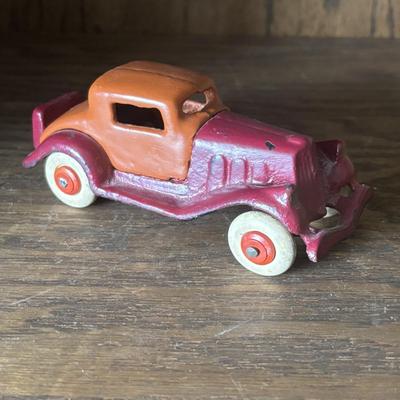 LOT 97: Cast Iron (3) and Tin Toy Car (1