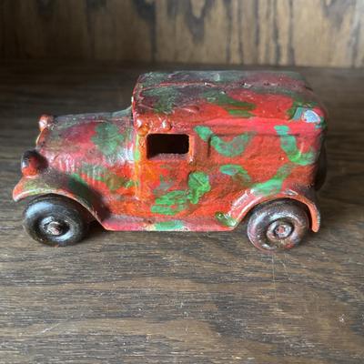 LOT 97: Cast Iron (3) and Tin Toy Car (1