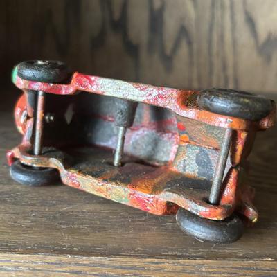 LOT 97: Cast Iron (3) and Tin Toy Car (1