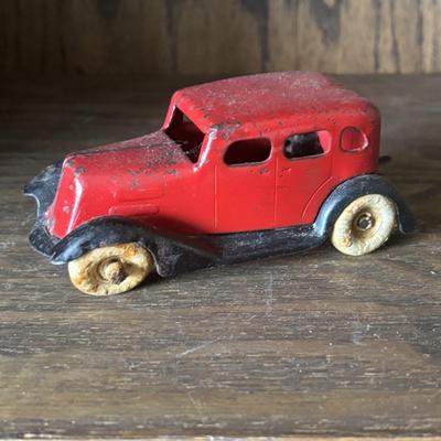 LOT 97: Cast Iron (3) and Tin Toy Car (1