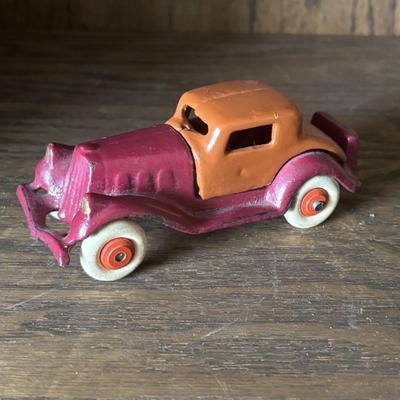 LOT 97: Cast Iron (3) and Tin Toy Car (1
