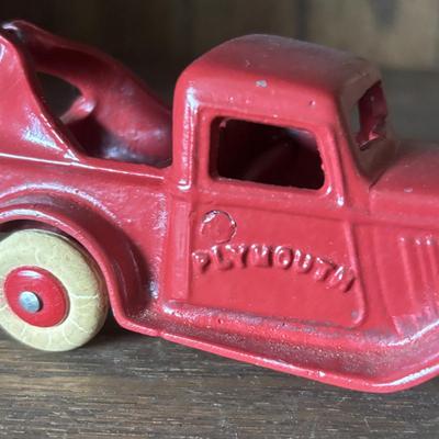 LOT 97: Cast Iron (3) and Tin Toy Car (1