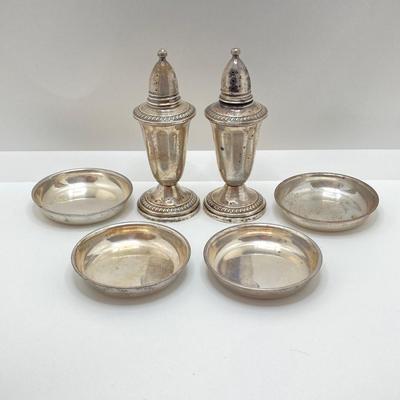 LOT 179: Weighted Sterling Salt and Pepper Shakers and Four Sterling Round Coasters