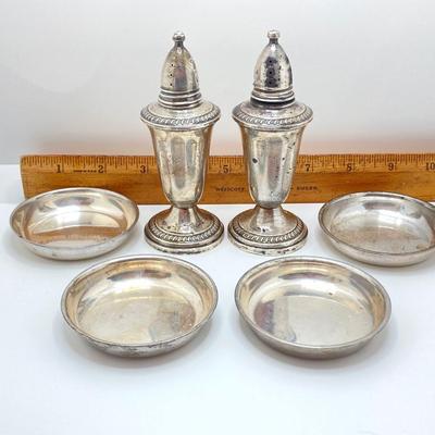 LOT 179: Weighted Sterling Salt and Pepper Shakers and Four Sterling Round Coasters