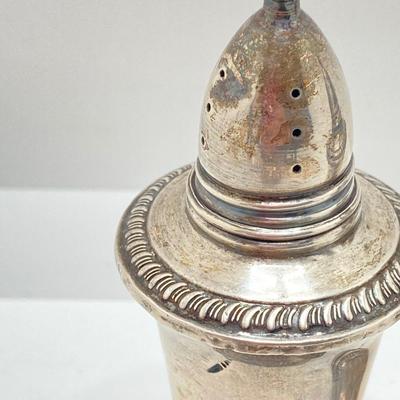 LOT 179: Weighted Sterling Salt and Pepper Shakers and Four Sterling Round Coasters