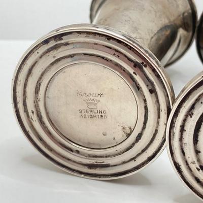 LOT 179: Weighted Sterling Salt and Pepper Shakers and Four Sterling Round Coasters