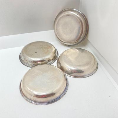 LOT 179: Weighted Sterling Salt and Pepper Shakers and Four Sterling Round Coasters