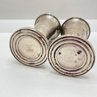 LOT 179: Weighted Sterling Salt and Pepper Shakers and Four Sterling Round Coasters