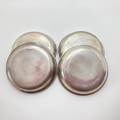 LOT 179: Weighted Sterling Salt and Pepper Shakers and Four Sterling Round Coasters