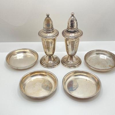 LOT 179: Weighted Sterling Salt and Pepper Shakers and Four Sterling Round Coasters