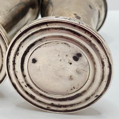 LOT 179: Weighted Sterling Salt and Pepper Shakers and Four Sterling Round Coasters