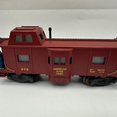 Sale Photo Thumbnail #13: American Flyer train set untested. 

The engine has some rust on the drive wheels and will need to be repaired.  

Everything else seems to be in great condition for its age.