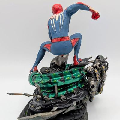 LOT 104: Captain America Tumbler, Marvel Vs. Capcom Diorama Figure, Mega Man, Spider Man Statues & Infinite Collector's Edition...