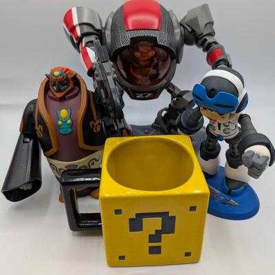 LOT 105: Collection Of Video Game Action Figures, Legend Of Zelda Gandorf, Mighty N0. 9, Plants Vs. Zombies GW2 Grass Effect Z7 Mech...