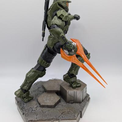 LOT 106: Legend Of Zelda Skyward Sword-Servo Action Figure, Halo Infinite Master Chief With Grappleshot Statue, Master Chief With Rifle...
