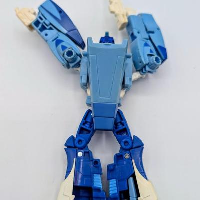 LOT 108: Transformers Generations Legacy Titan Cybertron & A Large Assortment Of Other Transformer Action Figures.