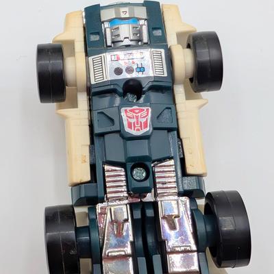 LOT 108: Transformers Generations Legacy Titan Cybertron & A Large Assortment Of Other Transformer Action Figures.