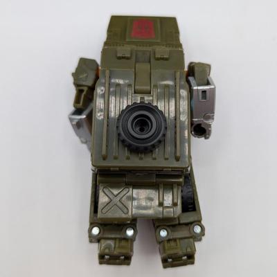 LOT 108: Transformers Generations Legacy Titan Cybertron & A Large Assortment Of Other Transformer Action Figures.