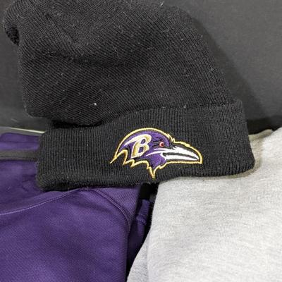 LOT 227: Baltimore Ravens Sweatshirt, 3 Long Sleeve Shirts, Sizes L & XL And A Knit Beanie