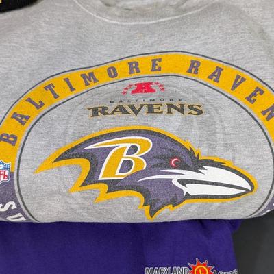 LOT 227: Baltimore Ravens Sweatshirt, 3 Long Sleeve Shirts, Sizes L & XL And A Knit Beanie