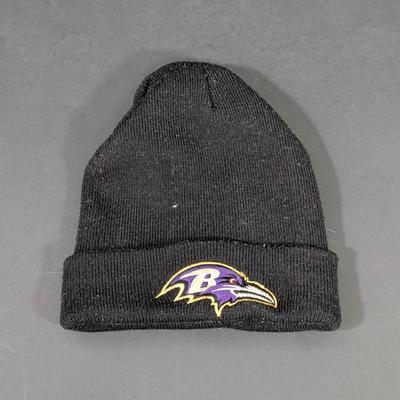 LOT 227: Baltimore Ravens Sweatshirt, 3 Long Sleeve Shirts, Sizes L & XL And A Knit Beanie