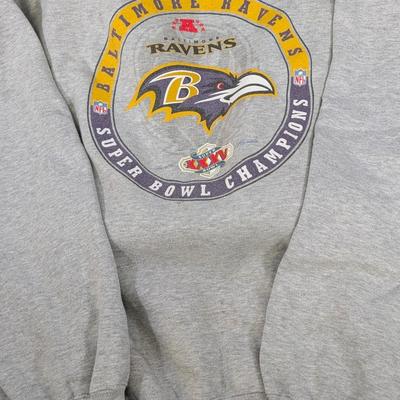 LOT 227: Baltimore Ravens Sweatshirt, 3 Long Sleeve Shirts, Sizes L & XL And A Knit Beanie