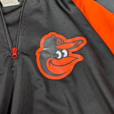 LOT 228: Baltimore Oriole Gear, Button Down Shortsleeve Shirt, Pullover, Sweatshirt, 2 Straw Hats, One Signed & 3 Baseball Caps. No...