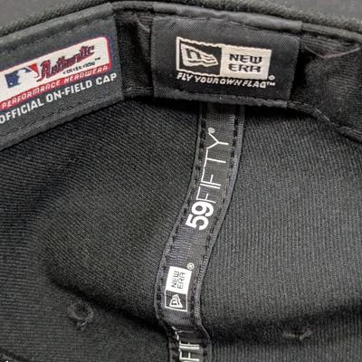 LOT 228: Baltimore Oriole Gear, Button Down Shortsleeve Shirt, Pullover, Sweatshirt, 2 Straw Hats, One Signed & 3 Baseball Caps. No...