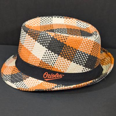 LOT 228: Baltimore Oriole Gear, Button Down Shortsleeve Shirt, Pullover, Sweatshirt, 2 Straw Hats, One Signed & 3 Baseball Caps. No...