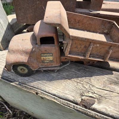 Lot 1 of vintage toy trucks