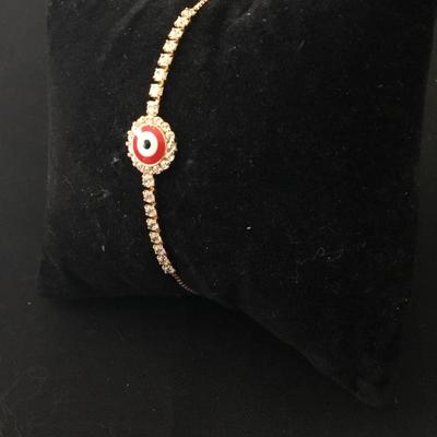 Gold tone slider, necklace, rhinestone