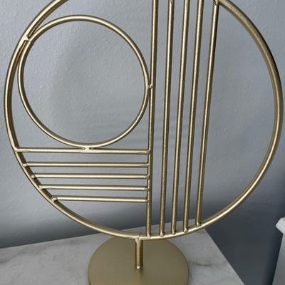 Sand Timer and gold circle decor
