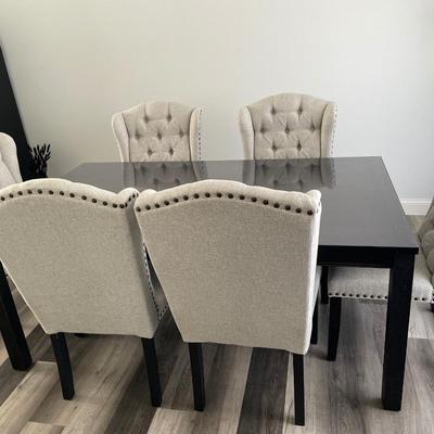 Jeanette Parsons dining room table with six high back chairs