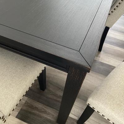 Jeanette Parsons dining room table with six high back chairs