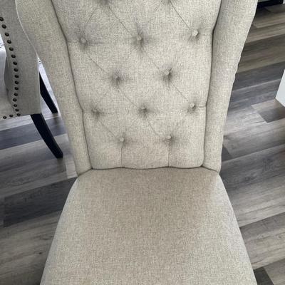 Jeanette Parsons dining room table with six high back chairs