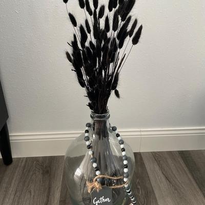 Large bottle with black cattails