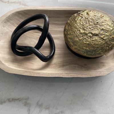 Black and gold decor with wood server