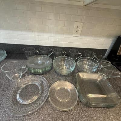 Beautiful glass sets including plates, mugs and bowls.